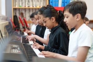children-playing-keyboards
