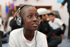 student with headphones